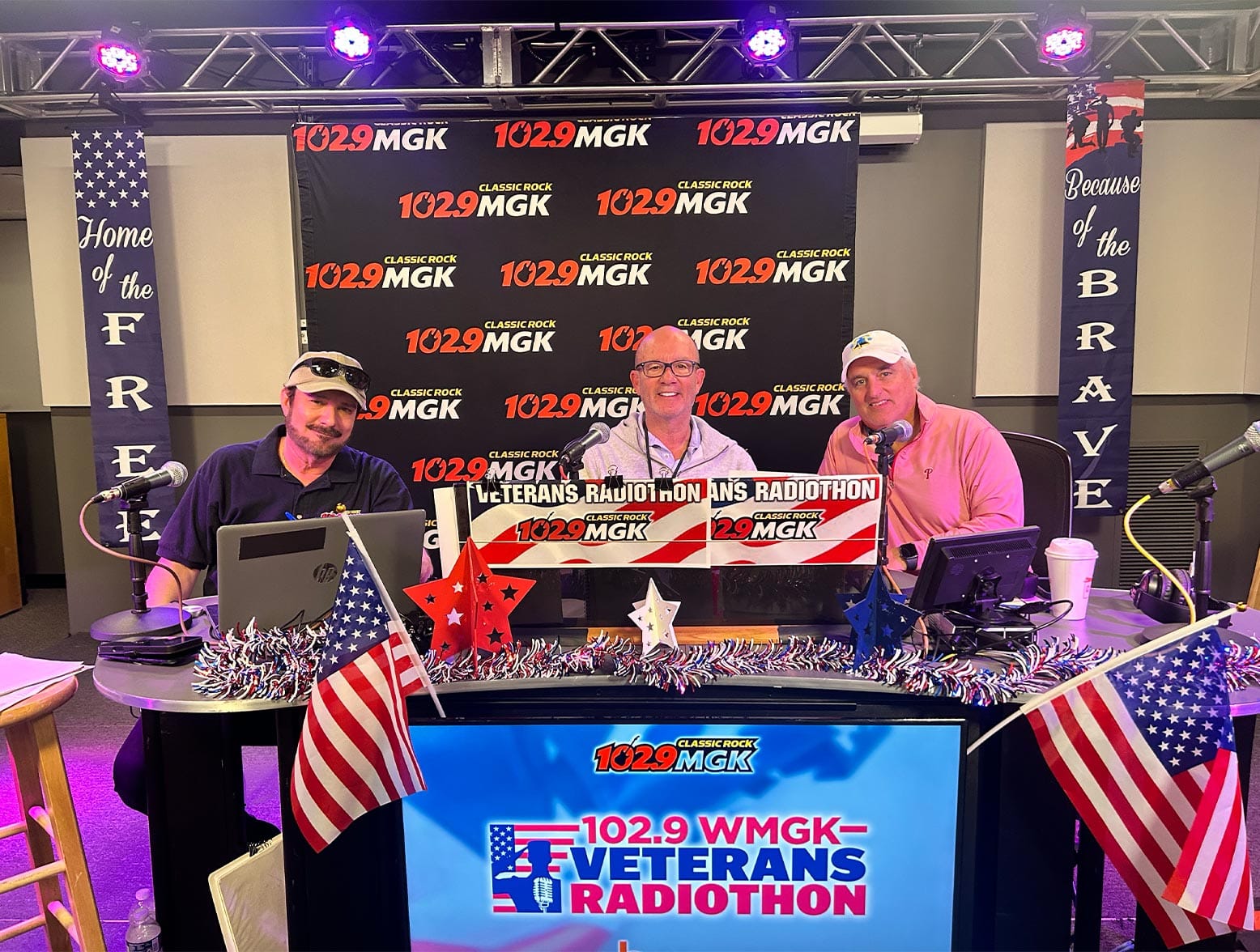 Veterans Radiothon event booth and hosts